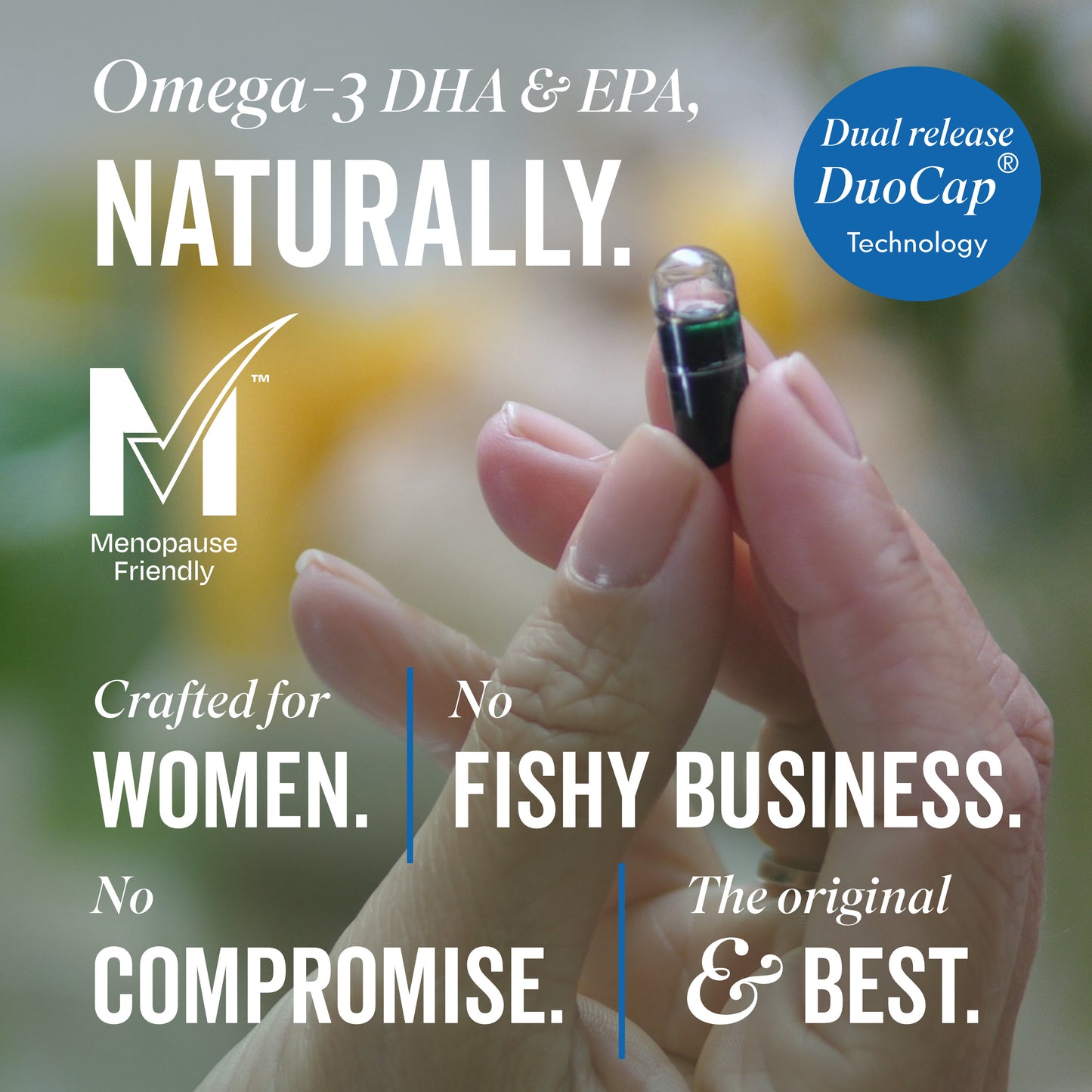Fingers Holding Duocap Capsule