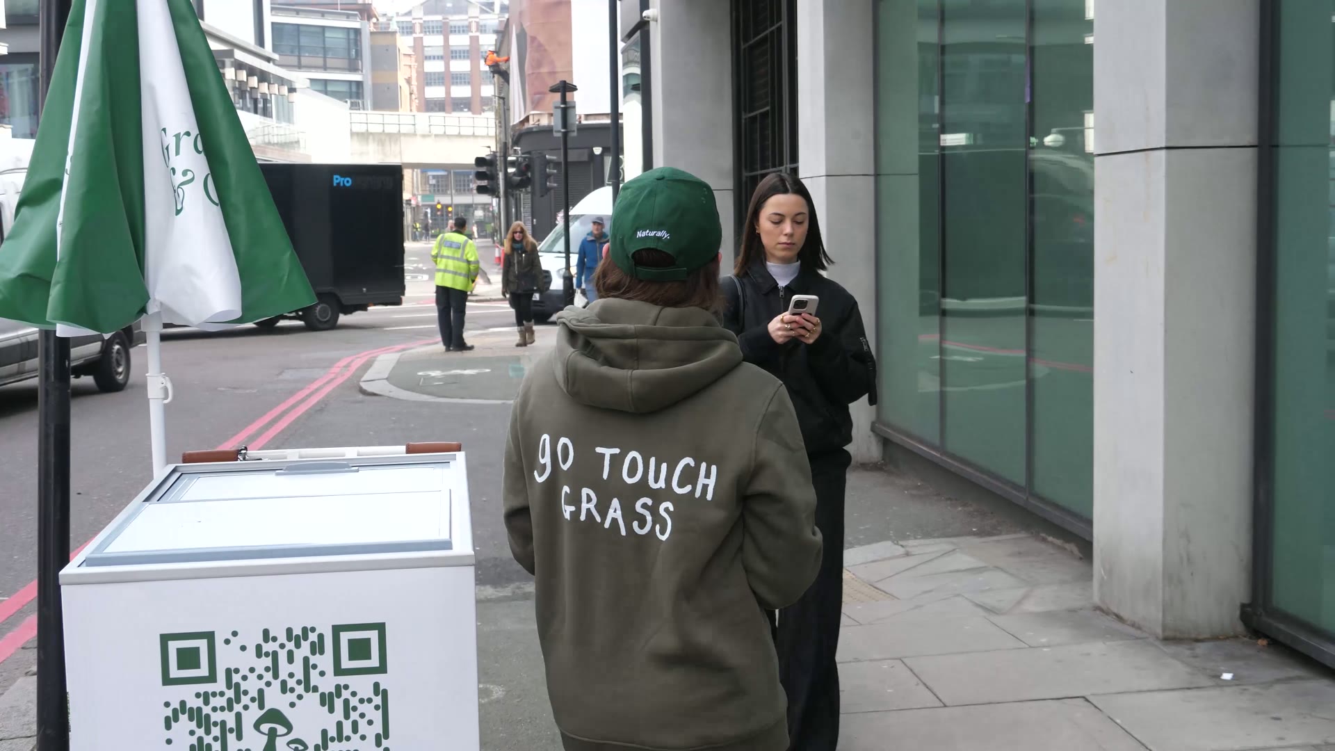 Touch Grass campaign poster